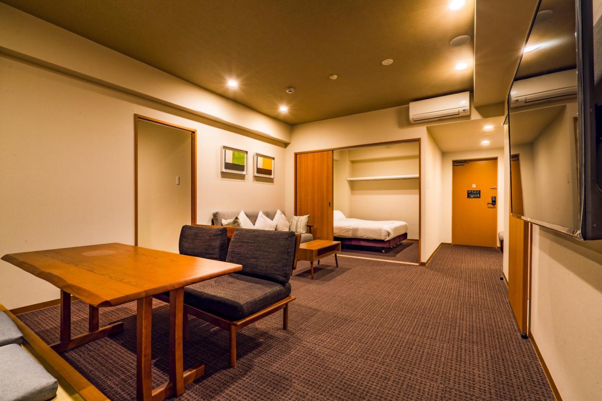 ランドーホテル京都スイーツ エクステリア 写真 A typical room at the hotel