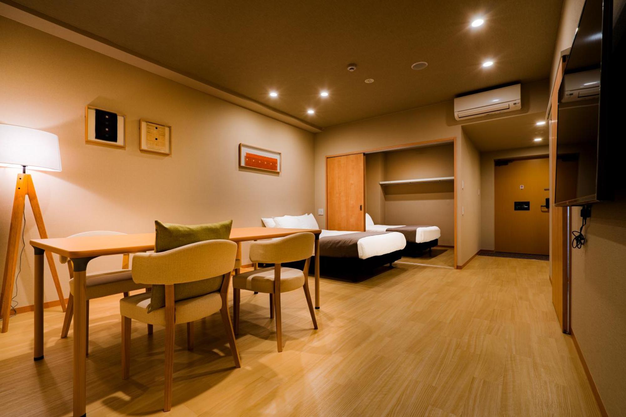 ランドーホテル京都スイーツ エクステリア 写真 A typical room at the hotel